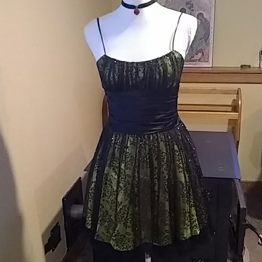 Green and black patterned dress